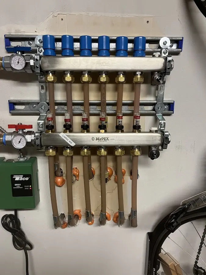 Plumber performing Water Heater Repair at a residential property in Kennewick